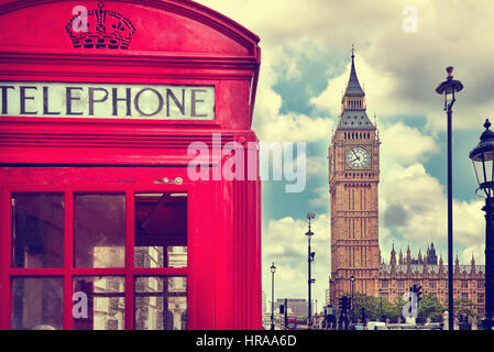 London - Big Ben tower and a red phone booth. Vintage film effect. Instagram filter Stock Photo