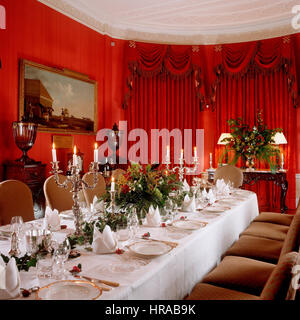 A dining room with lit candles. Stock Photo