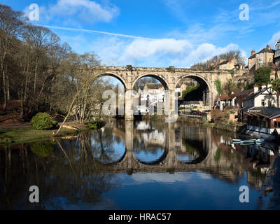 Stone Railway Viaduct Built 1851 Reflected in the River Nidd in Early Spring Knaresborough North Yorkshire England Stock Photo