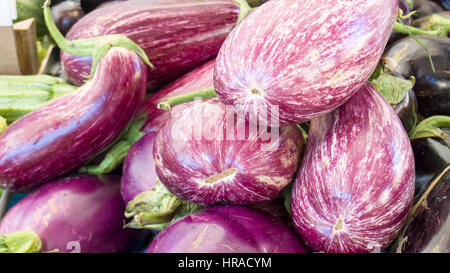 Graffiti aubergine / eggplant for sale in an Italian market Stock Photo
