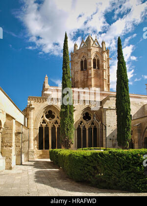 Cloister and bell tower of cisterian monastery Santa Maria de Vallbona de les Monges Stock Photo