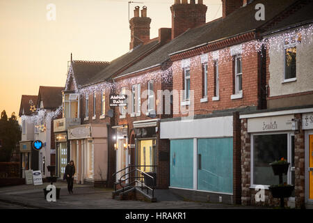 Sunset at Alsager village shops on Crewe Road- Lawton Road  East Cheshire, England,UK. Stock Photo