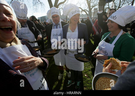 London, UK. 28th Feb, 2017. Members of the MP team prepare for the Rehab Parliamentary Pancake Race in Victoria Tower Gardens, in London, Britain on Feb. 28, 2017. The annual race held on Shrove Tuesday is a relay between MPs, Lords and the media, and raises money for the Rehab disability charity. Credit: Tim Ireland/Xinhua/Alamy Live News Stock Photo