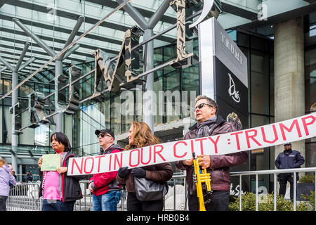 Vancouver, Canada. 28th Feb, 2017. Anti-Trump protestors. Trump Hotel Tower official opening, Vancouver, British Columbia, Canada. Credit: Michael Wheatley/Alamy Live News Stock Photo