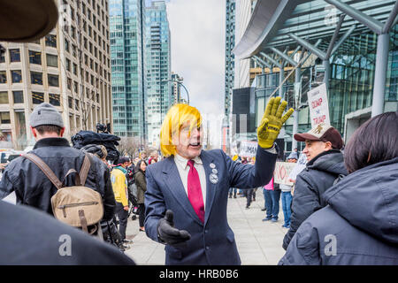 Vancouver, Canada. 28th Feb, 2017. Anti-Trump protestors. Trump Hotel Tower official opening, Vancouver, British Columbia, Canada. Credit: Michael Wheatley/Alamy Live News Stock Photo