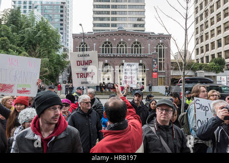 Vancouver, Canada. 28th Feb, 2017. The opening of the Trump international Hotel attracted a few hundred anti-Trump protesters unhappy with the 'Trump' name being associated with the City of Vancouver. Trump International Hotel. Credit: Gerry Rousseau/Alamy Live News Stock Photo