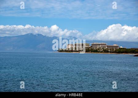 Hotels and resorts along the southern shore of Kaanapali Beach, Maui, Hawaii on Sunday, February 26, 2017. The Hawaiian Island of Molokai looms in the distance behind the buildings. Visible from this angle are the Hyatt Regency Maui Resort and Spa, the Hyatt Kaanapali Beach Residence Club, and the Marriott Maui Ocean Club. - NO WIRE SERVICE - Photo: Ron Sachs/Consolidated/dpa Stock Photo