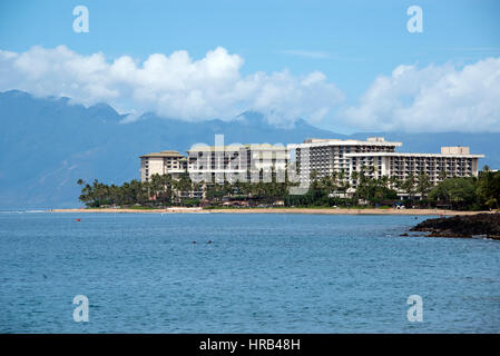 Hotels and resorts along the southern shore of Kaanapali Beach, Maui, Hawaii on Sunday, February 26, 2017. The Hawaiian Island of Molokai looms in the distance behind the buildings. Visible from this angle are the Hyatt Regency Maui Resort and Spa, the Hyatt Kaanapali Beach Residence Club, and the Marriott Maui Ocean Club. - NO WIRE SERVICE - Photo: Ron Sachs/Consolidated/dpa Stock Photo