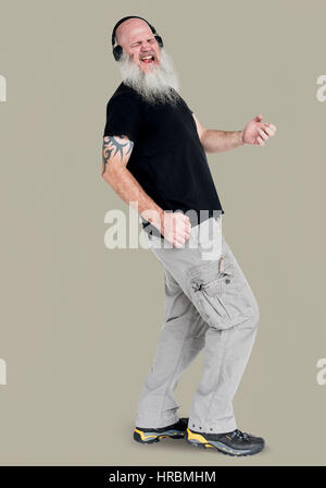 Bearded rocker guy playing air guitar portrait Stock Photo - Alamy