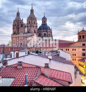 Roofs and Iglesia de la Clerecia in Salamanca at dusk, Castilla y Leon, Spain Stock Photo