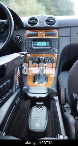 Mercedes Benz W209- year 2005, Elegance equipment, black metallic paint near a rock wall photo session, automatic gear box, navigation, heated seats Stock Photo