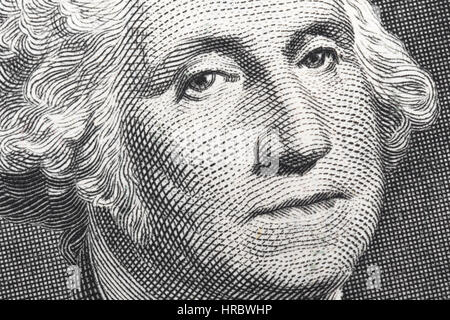 Macro-photo of George Washington's face on US $1 / one dollar bill. Stock Photo