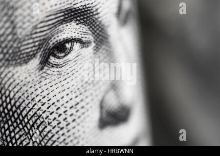 Macro-photo of George Washington's face on US $1 / one dollar bill. Eye on dollar. Stock Photo