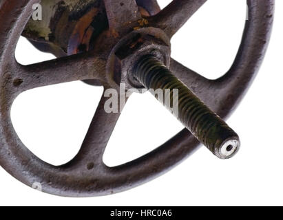 Industrial Valve Wheel And Stem, Weathered Grunge Latch Closeup Isolated Stock Photo
