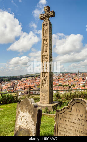 Celtic Cross at the Graveyard of Whitby Abbey. Whitby, North Yorkshire, England Stock Photo