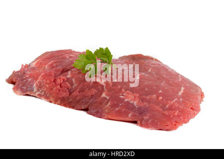 Fresh raw beef steak isolated on white with parsley Stock Photo