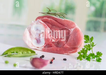 Uncooked organic hock of lamb meat in kitchen Stock Photo