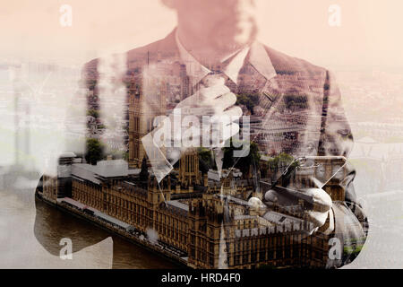 double exposure of success businessman holding tie and using smart phone,thinking,front view,filter effect,London buildings city Stock Photo