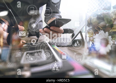Man using VOIP headset with digital tablet computer docking keyboard,smart phone,concept communication, it support, call center and customer service h Stock Photo