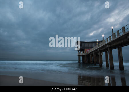 The Pier at Addington Beach on a Cloudy Morning Stock Photo