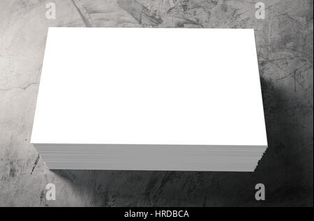 stack of blank name cards on grey background Stock Photo