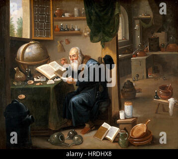 An alchemist in his laboratory. Oil painting by a follower o Wellcome V0017631 Stock Photo