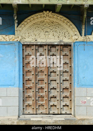 Traditional carved wooden door in Stone Town, Zanzibar Stock Photo