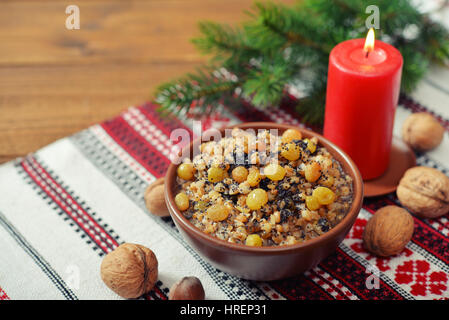 Traditional Christmas slavic dish kutia in ceramic bowl with fir tree Stock Photo