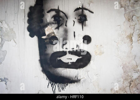 Clown face graffiti at the abandoned, old Iraqi Embassy in Berlin, Germany. Stock Photo