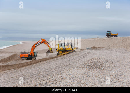 Construction of sea defences on Chesil Beach, Portland, Dorset, UK Stock Photo