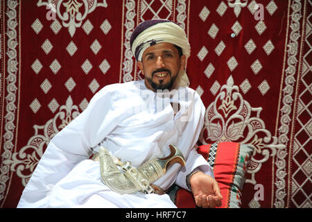 Participants at the Heritage Village, at the Muscat Festival in Amerat Park, Oman Stock Photo