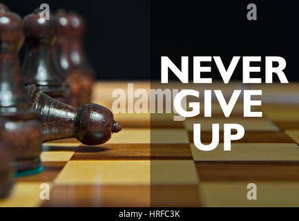 Chess figures with Motivational message Stock Photo