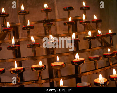Prayer candles in St. Davids Cathedral, Wales UK. Stock Photo