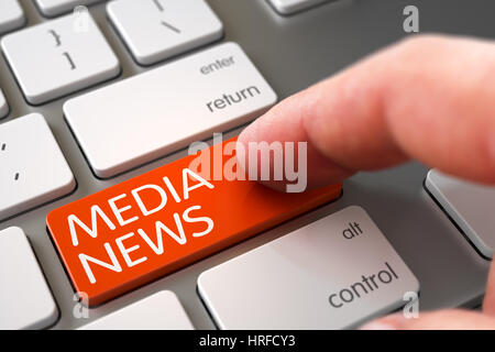 Man Finger Pressing Orange Media News Keypad on Aluminum Keyboard. 3D. Stock Photo