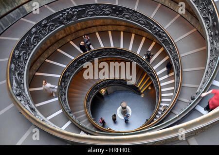 VATICAN - MARCH 15, 2016: The spiral staircase in the Vatican Museum is visited daily by thousands of tourists on the way of the exit from the museum Stock Photo