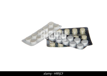 Blister packs of pills isolated on the white background, three package of pills. Close Stock Photo