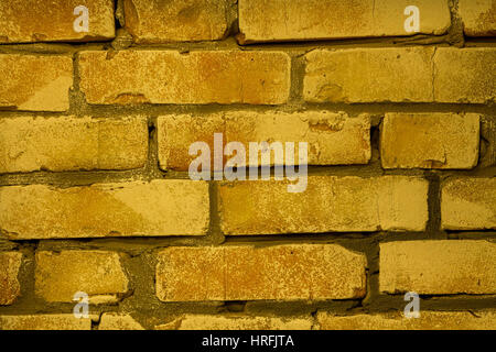Brick wall. Brick background. The warm tone. Stock Photo