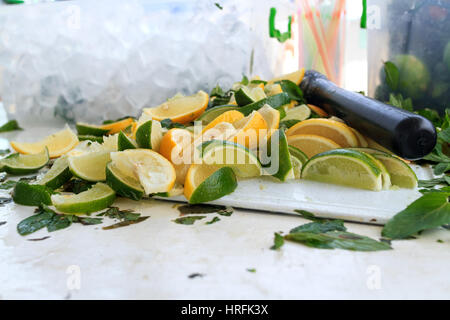 Fresh chopped ingredients for a refreshing cocktail with ice Stock Photo