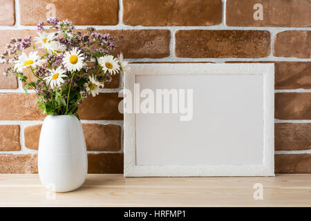 https://l450v.alamy.com/450v/hrfmp1/white-landscape-frame-mockup-with-wwildflowers-bouquet-in-styled-vase-hrfmp1.jpg