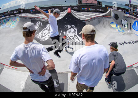 Sydney, Australia. 02nd Mar, 2017. Skateboarders look on during a practice session in the Vans Pro Bowl during the Vans Park Series terrain skateboarding world championship tour as fans watch during the 6th day of the Australian Open of Surfing in Manly Beach, Australia. Credit: Hugh Peterswald/Pacific Press/Alamy Live News Stock Photo