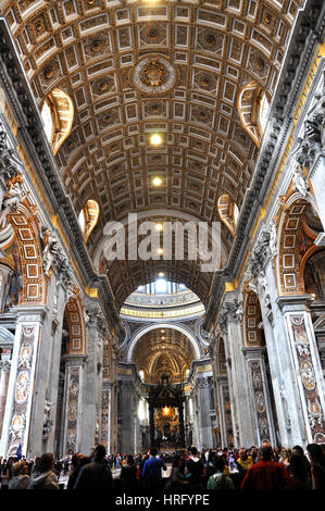 VATICAN, ITALY - MARCH 16, 2016: The famous Saint Peter basilica is the biggest church in the World and is visited daily by thousands of tourists and  Stock Photo