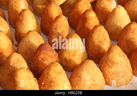 delicious rice balls made with fried rice. A typical dish of Mediterranean cuisine called Arancini in Italy Stock Photo