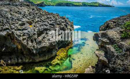 Beautiful Cliff Formation with Yellow Pool, Bizarre Place, Nusa Penida Bali Indonesia Stock Photo