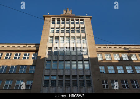 Nazi Reichsadler topped the office building from the Nazi era in Friedrichstraße in Berlin, Germany. The building designed by German architect Hans Fritzschez was built in 1938-1940. It was used as the department of the Reichsarbeitsministerium (Nazi German Ministry of Labor) and the Organisation Todt, now served as the Bundesagentur fur Arbeit (Unemployment Office). Stock Photo