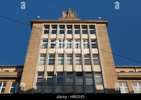 Nazi Reichsadler topped the office building from the Nazi era in Friedrichstraße in Berlin, Germany. The building designed by German architect Hans Fritzschez was built in 1938-1940. It was used as the department of the Reichsarbeitsministerium (Nazi German Ministry of Labor) and the Organisation Todt, now served as the Bundesagentur fur Arbeit (Unemployment Office). Stock Photo