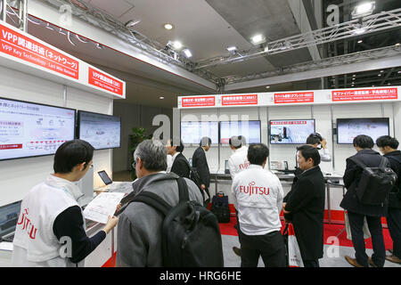 Tokyo, Japan. 1st Mar, 2017. Visitors gather at Fujitsu booth during the World Smart Energy Week 2017 in Tokyo Big Sight on March 1, 2017, Tokyo, Japan. World Smart Energy Week 2017 consists of 9 exhibitions connected with new and renewable energy sources and is the largest trade show in this field in Japan. It expects to host 1,570 exhibitors and to attract an estimated 70,000 professional visitors over three-days up until Friday 3rd. Credit: Rodrigo Reyes Marin/AFLO/Alamy Live News Stock Photo