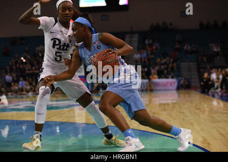 CONWAY, SC - MARCH 01: North Carolina Tar Heels guard Jamie Cherry (10) drives around Pittsburgh Panthers forward Kauai Bradley (5) during the game between the North Carolina Tarheels and the Pitt Panthers in the ACC Women's Tournament on March 1, 2017 at HTC Arena in Conway, SC. North Carolina defeated Pitt 72-60. William Howard/CSM Stock Photo