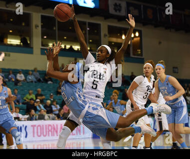 CONWAY, SC - MARCH 01: North Carolina Tar Heels guard Jamie Cherry (10) lunges for a shot with Pittsburgh Panthers forward Kauai Bradley (5) during the game between the North Carolina Tarheels and the Pitt Panthers in the ACC Women's Tournament on March 1, 2017 at HTC Arena in Conway, SC. North Carolina defeated Pitt 72-60. William Howard/CSM Stock Photo