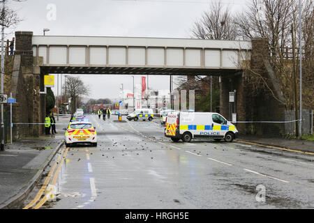 Newbold, Rochdale, UK. 2nd Mar, 2017. Police attend incident on the tram line where a man is throwing stones from the tracks on the bridge, Newbold, Rochdale, 2nd March, 2017 Credit: Barbara Cook/Alamy Live News Stock Photo