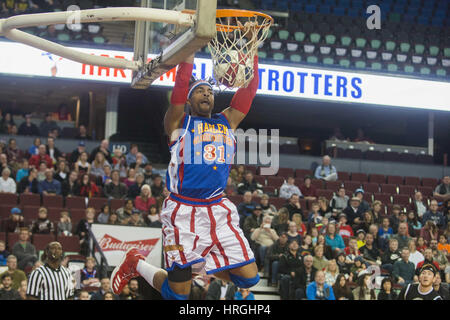 March 1, 2017 - Calgary, Alberta, Canada - Hammer Harrison of The Harlem Globe Trotters slam dunks a basket during a game in Calgary. (Credit Image: © Baden Roth via ZUMA Wire) Stock Photo